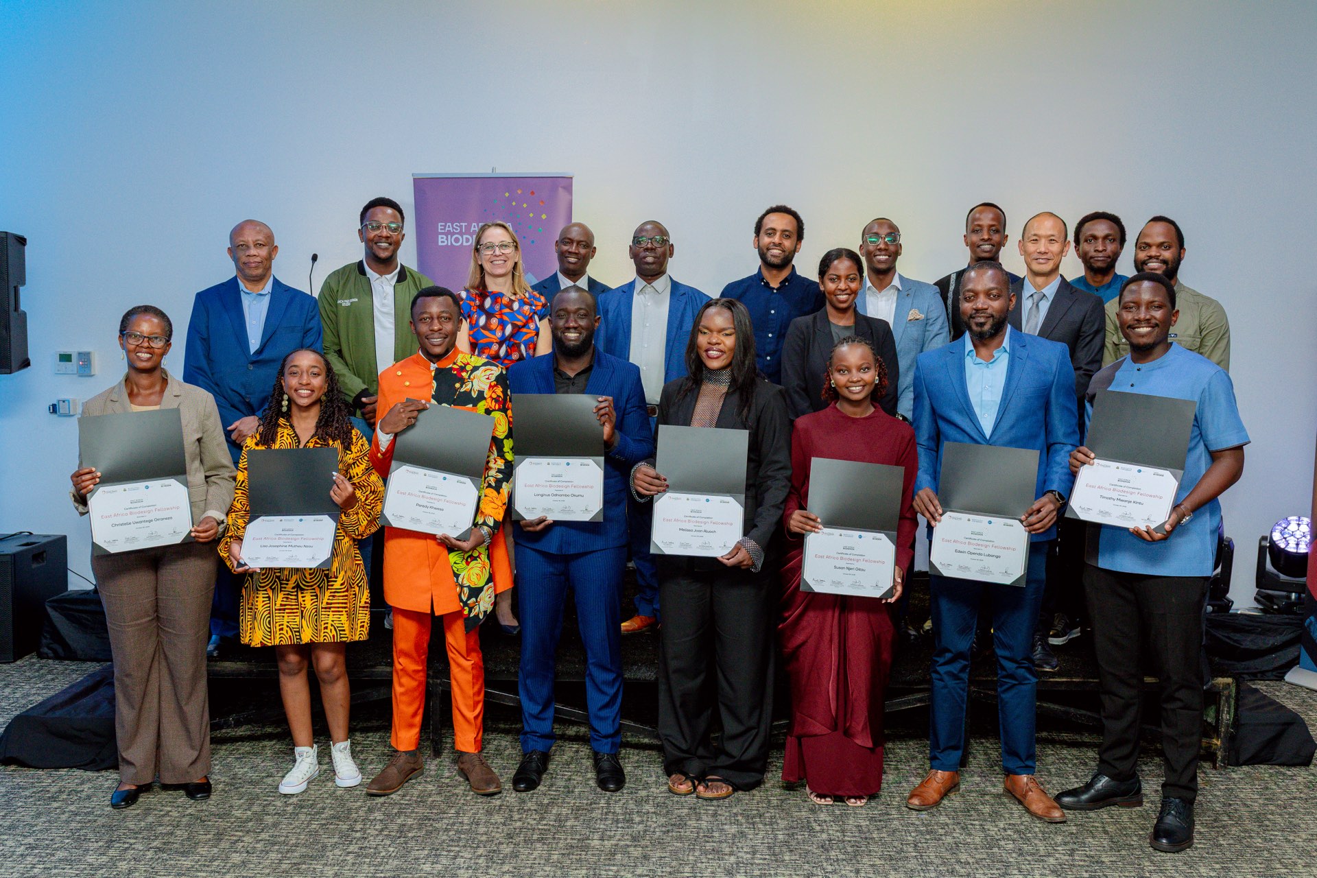 East Africa Biodesign fellows and faculty with their certificates at the graduation ceremony